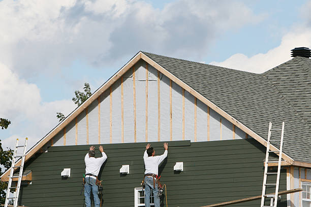 Professional Siding Installation technician working in Madison, WV